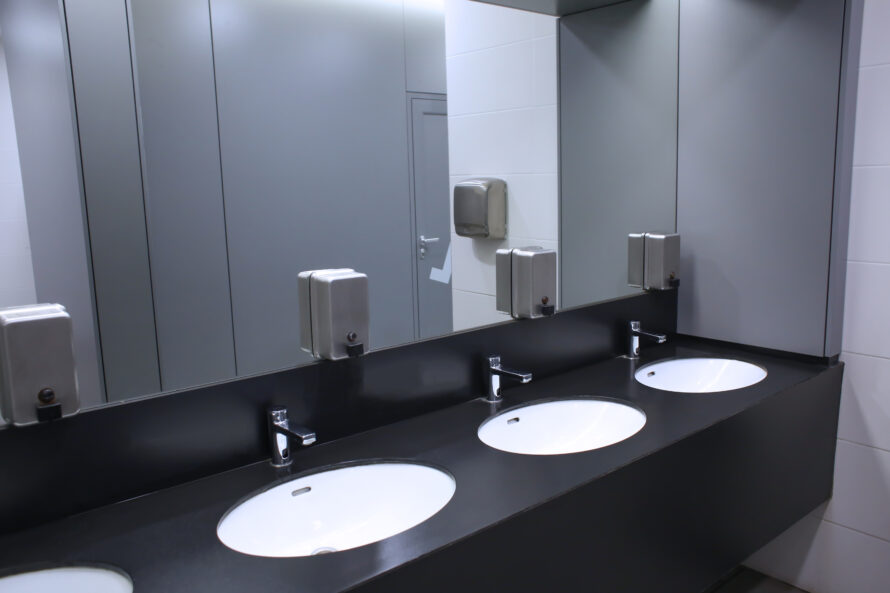 Modern sinks with mirror in public toilet