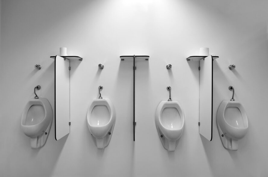 Public restroom urinal.
